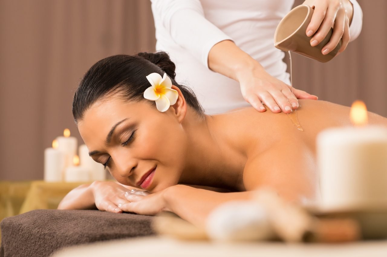 Woman having a back massage at day spa in New Jersey